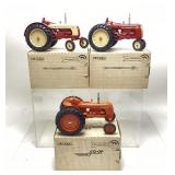 3) ERTL Cockshutt die cast Tractors