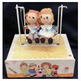 VTG. RAGGEDY ANN & ANDY MUSICAL SWING BOX, 6.5in W