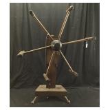 Antique wooden yarn winder, also known as a