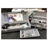 2 Dremel power tools