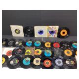 34 7-inch 45 RPM vinyl records