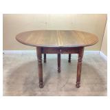 Antique Oak drop leaf dining table with five