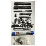 ASSORTED PISTOL PARTS, COLT BARRELS, GUN PARTS