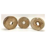 3 Antique milling, grinding stones