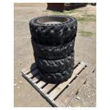 Lot of (4) Solid Skid Steer Tires/Wheels