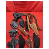 Box Lot of Holsters and Slings