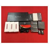 Box Lot of New Knives, Pistol Mounts and More