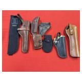 Box Lot of Assorted Holsters and Mags