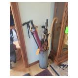 Canes umbrellas and stand