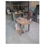 Metal and wood table with breaker box