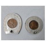 Two incased lucky pennies