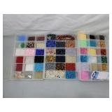 Four boxes of craft beads
