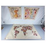 Cloth wall hangings with words of wisdom