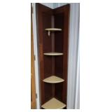 Repurposed door corner shelf.