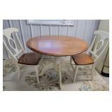 Round drop leaf table with 2 chairs