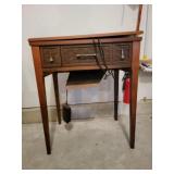Singer Sewing Machine in Cabinet 25" x 18" x 31"