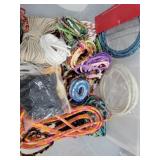 Wrapped cord ready for projects in nice bin