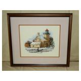 needlepoint picture of a lighthouse and farm house