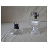 Two small oil lamps. One is a Queen Anne #1