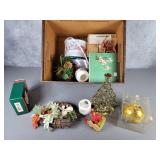 Box of Christmas items, ornaments, votives