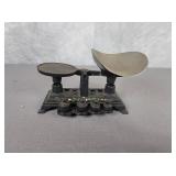 Cast iron scale with weights