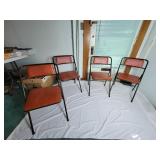 Four Cosco Folding Chairs. Vinyl seat and back