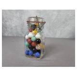 Lidded jar full of marbles