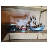 Cast Iron finial, plastic car & boat, sand art