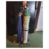 Oxygen tank with carrier