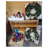 Two wreaths, ornaments, and centerpiece