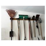 Yard Tools on Walls and Brooms