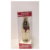 Coca Cola Gold Bottle & pin 100 yrs. 1899 - 1999