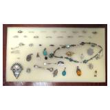 40 pieces of Sterling jewelry with display case