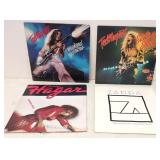 Four Rock & Roll Albums with covers