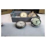 Four vintage pocket watches