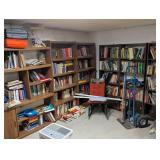 Large corner of room full of books