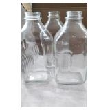 Three Vintage Milk bottles