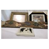 Three pictures and a wooden farmyard scene