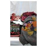 A variety of Holiday Sweaters