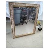 Decorative Wall Mirror with Brasstone Frame.