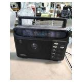 Optimus AM/FM Stereo Radio