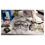 Safety glasses and plain clear glass,
