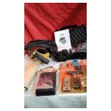 Jumper cables, gun case, knife wipes