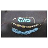turqouise bracelets and a necklace