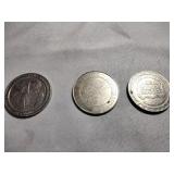 Three 1$ gaming tokens