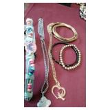 Five bracelets,  and 3 necklaces