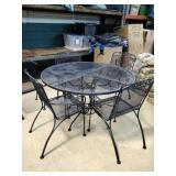 Wrought Iron Patio Table and 5 Chairs