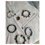5 Bracelets and a turqouis necklace