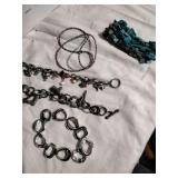 Four bracelets and a beaded necklace