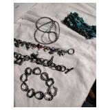 Four bracelets and a beaded necklace